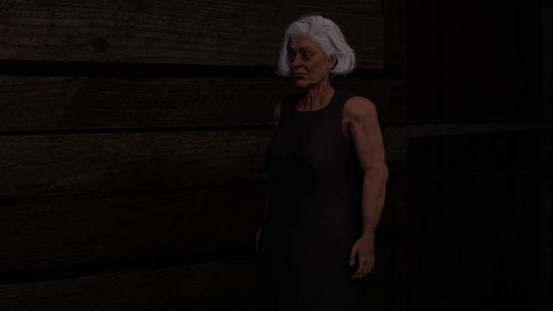 La mujer de pelo blanco, con un vestido oscuro sin mangas, de pie junto a una pared de madera.